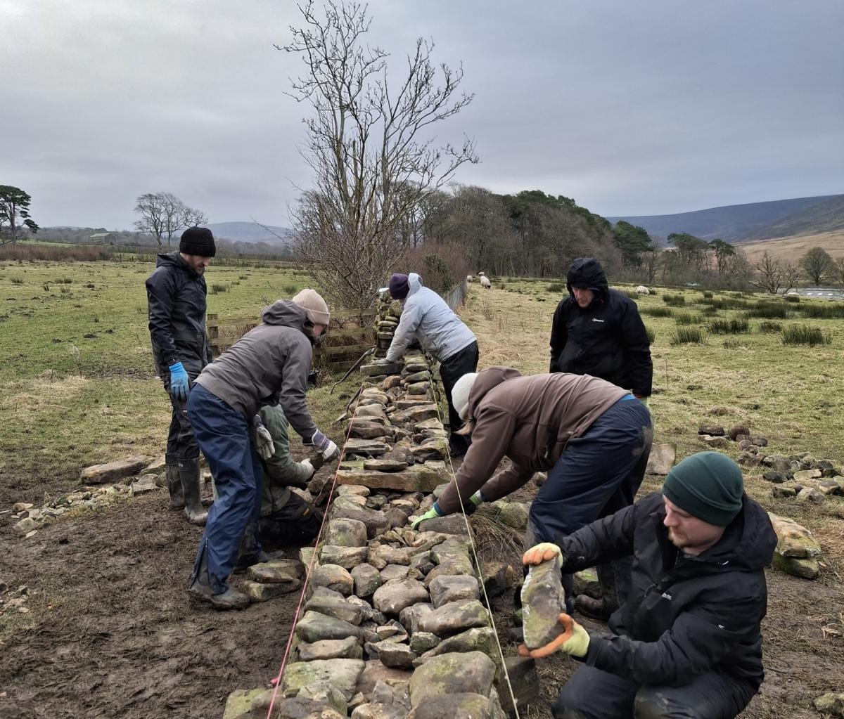 Dry stone walling course participants Dry stone walling course participants